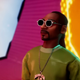 Snoop Dogg stares dead-eyed into the distance during a digital performance at the 2022 VMAs.